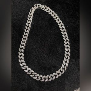 Silver necklace.